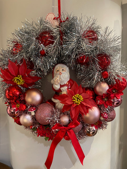 Christmas Wreath with Santa and Poinsettias Kitsch