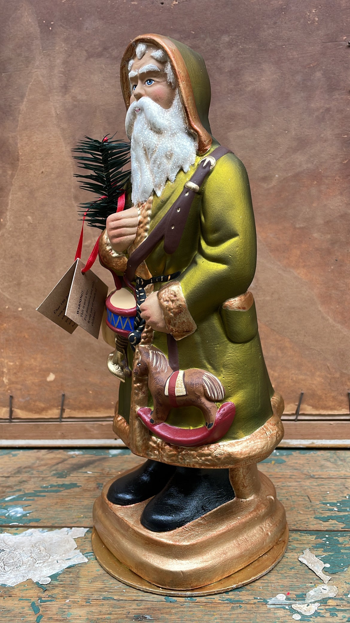 Green Matte Santa with Rockinghorse and Toys | Ino Schaller