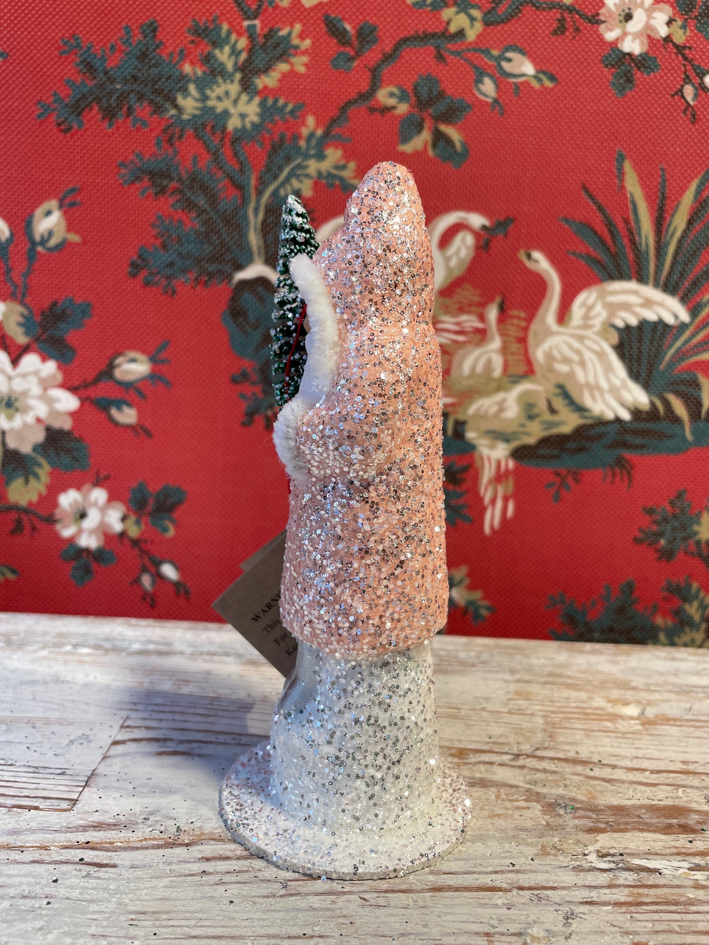 Nude Pink Glittered Santa Holding Frosted Tree | Ino Schaller