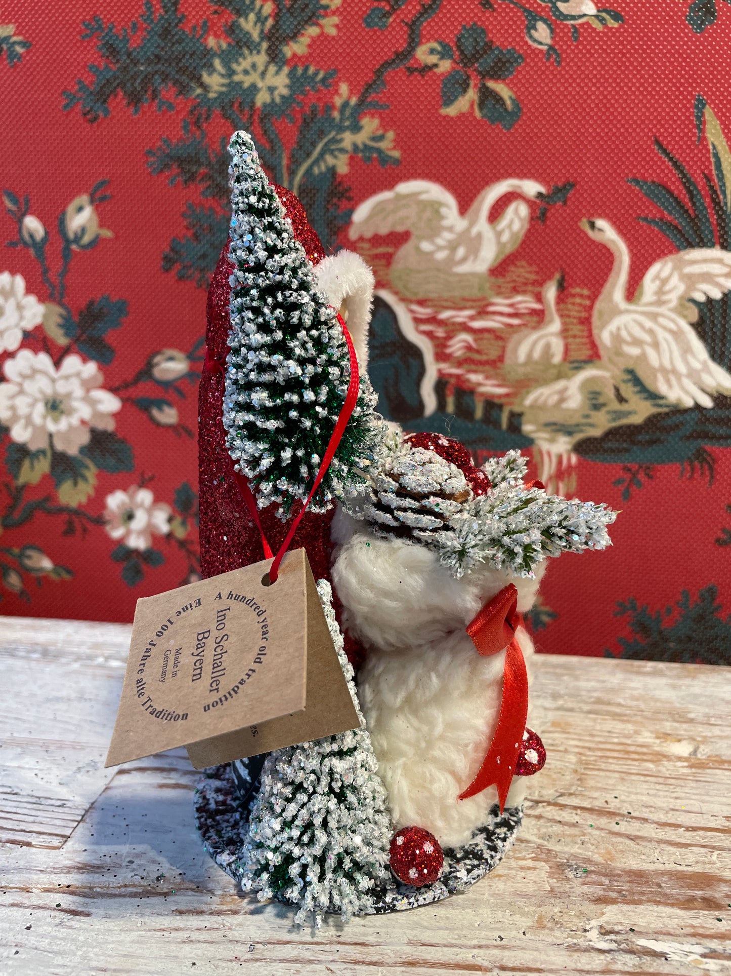 Red Glitter Santa with Bag of Woodland Treats | Ino Schaller