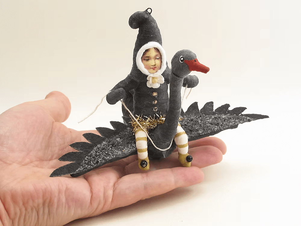 Black Swan Rider Elf Ornament | Vintage by Crystal Spun Cotton Ornament - Bon Ton goods