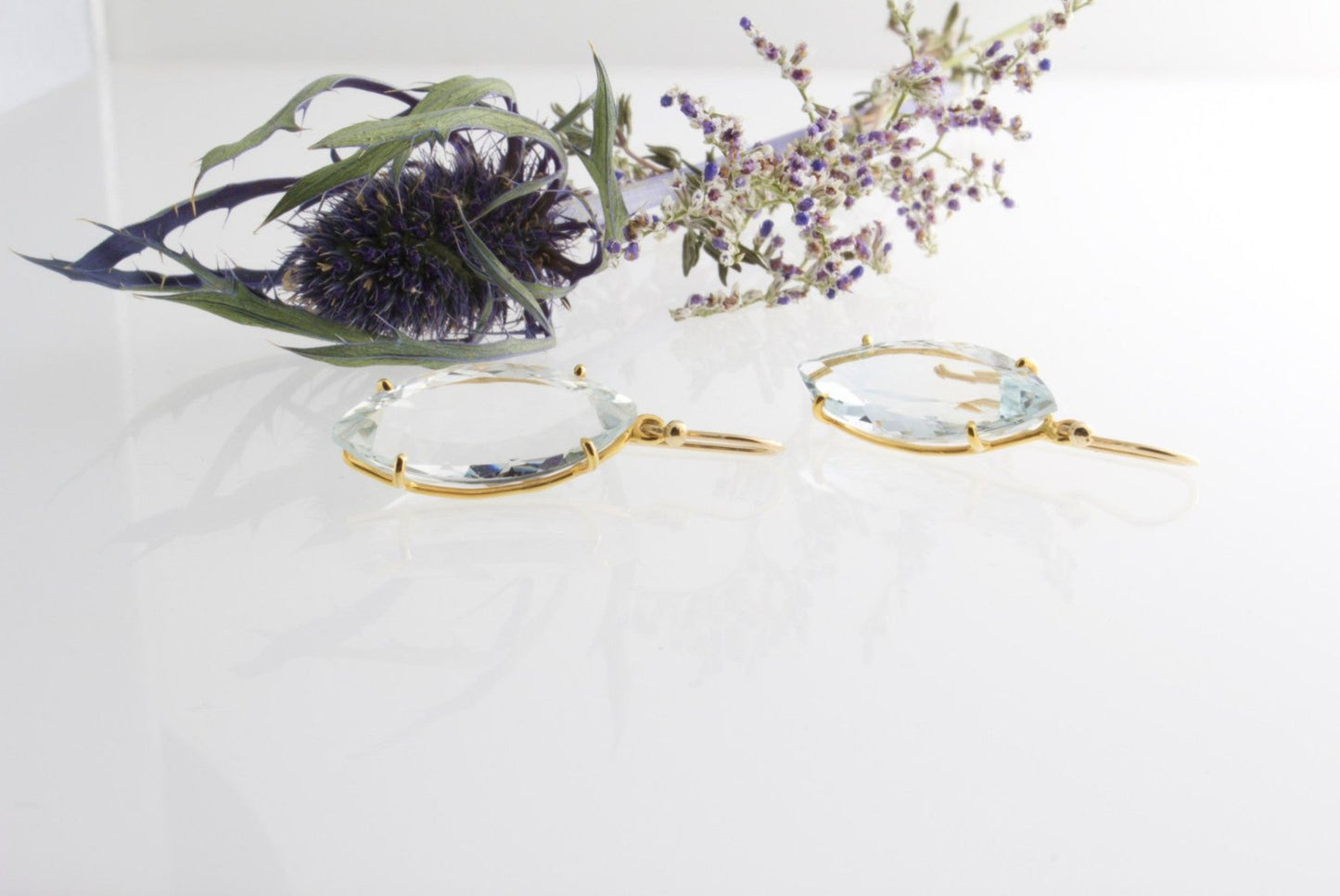 FACETED BLUE TOPAZ EARRINGS - Bon Ton goods