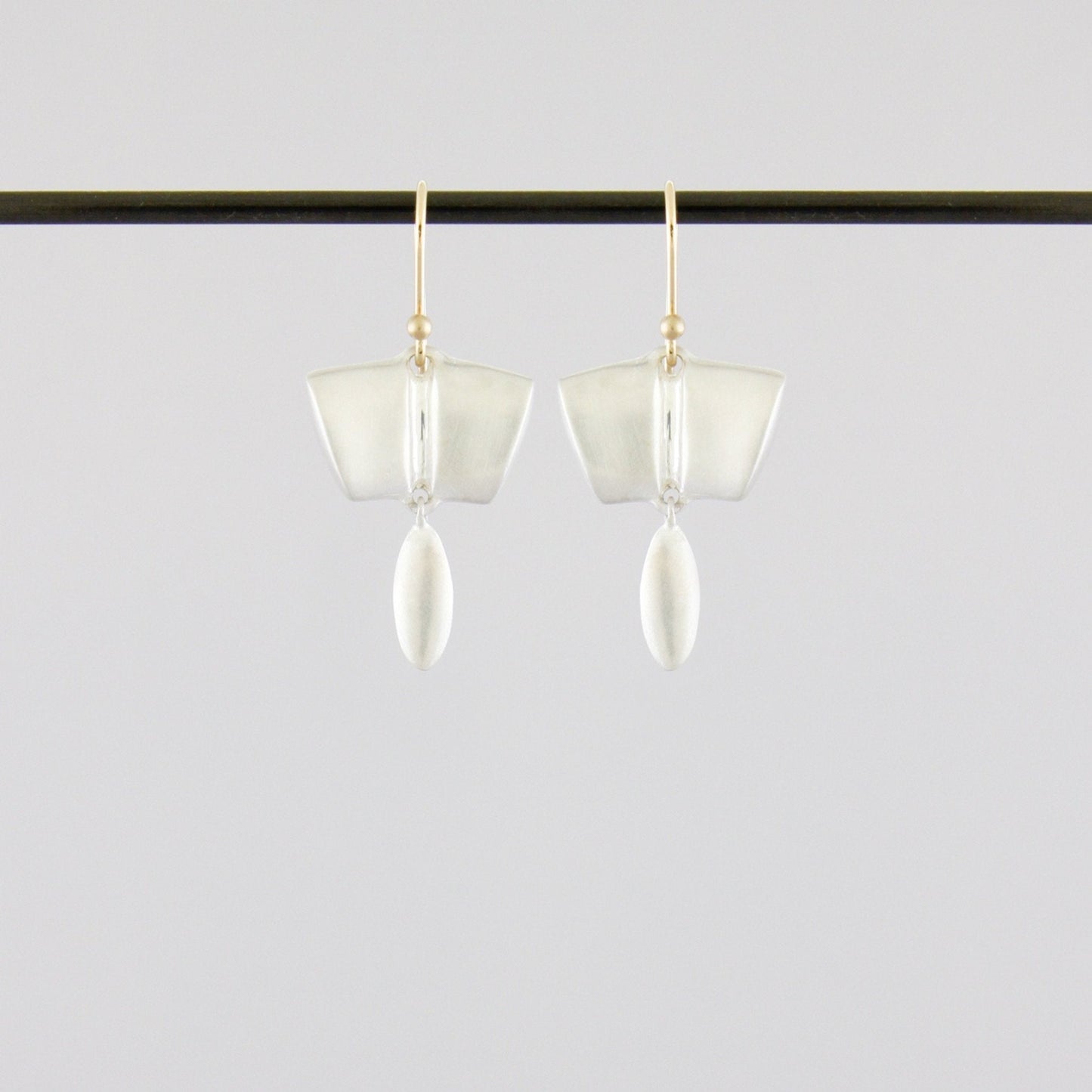 Oval Bar Dangle - Bon Ton goods