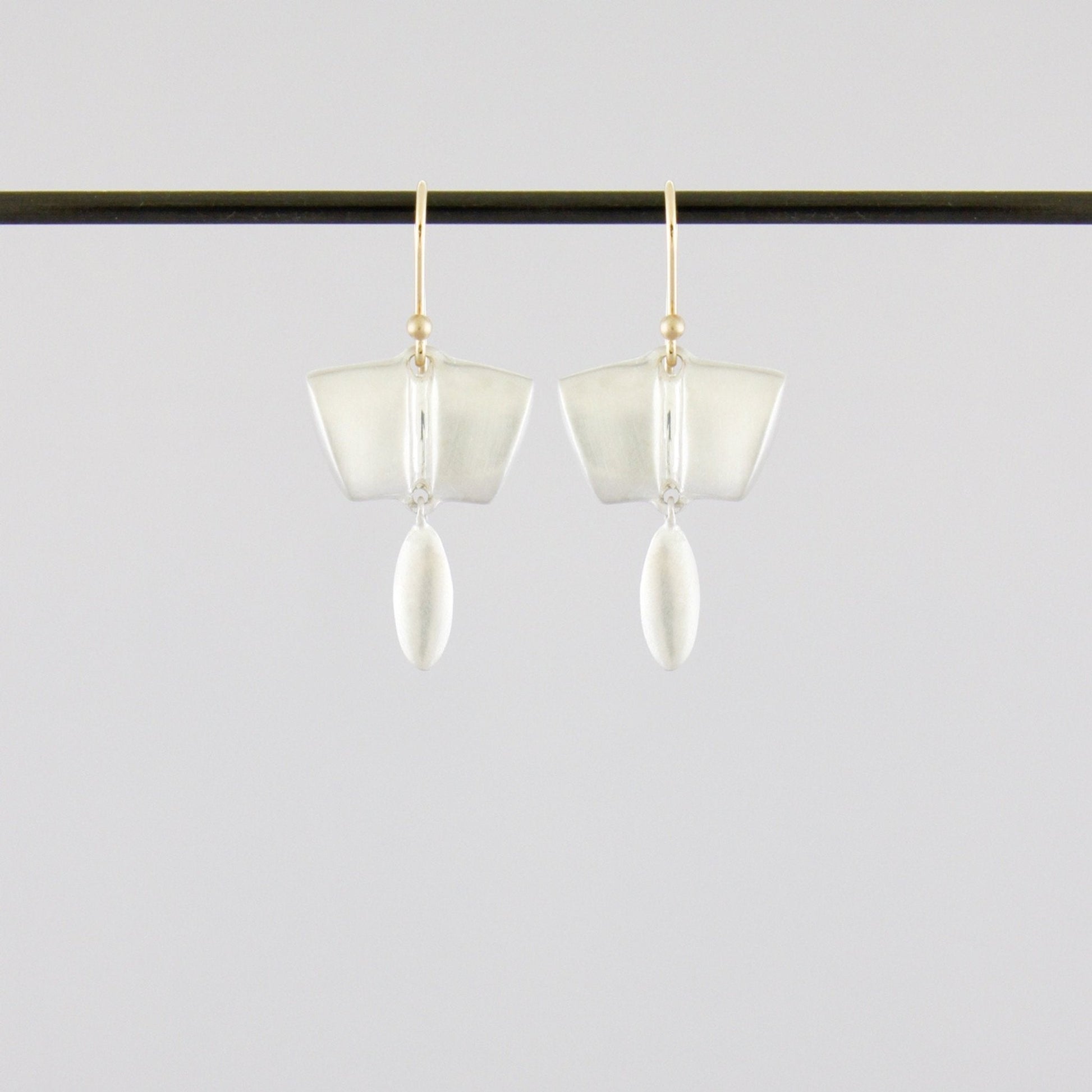 Oval Bar Dangle - Bon Ton goods