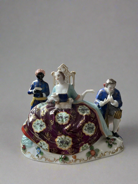 The Handkiss Porcelain Figurine