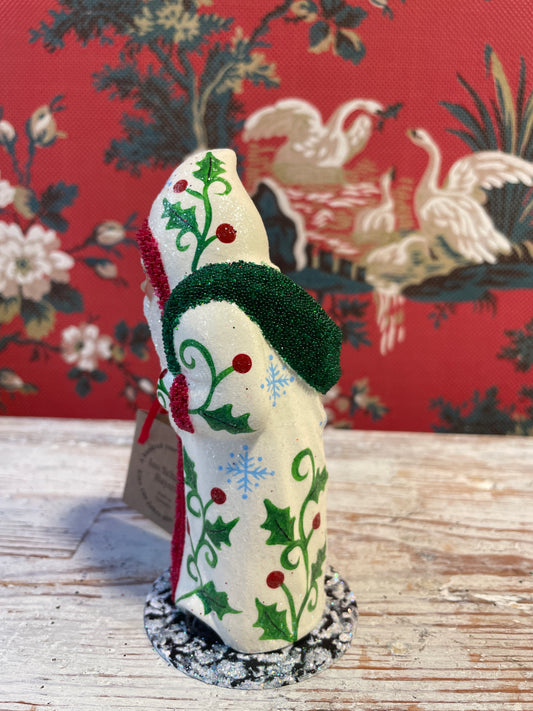Cream Coat Santa Holding Tree | Ino Schaller