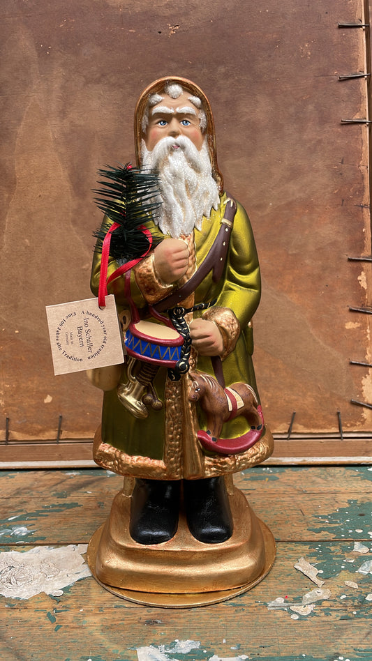 Green Matte Santa  with Rockinghorse and Toys | Ino Schaller