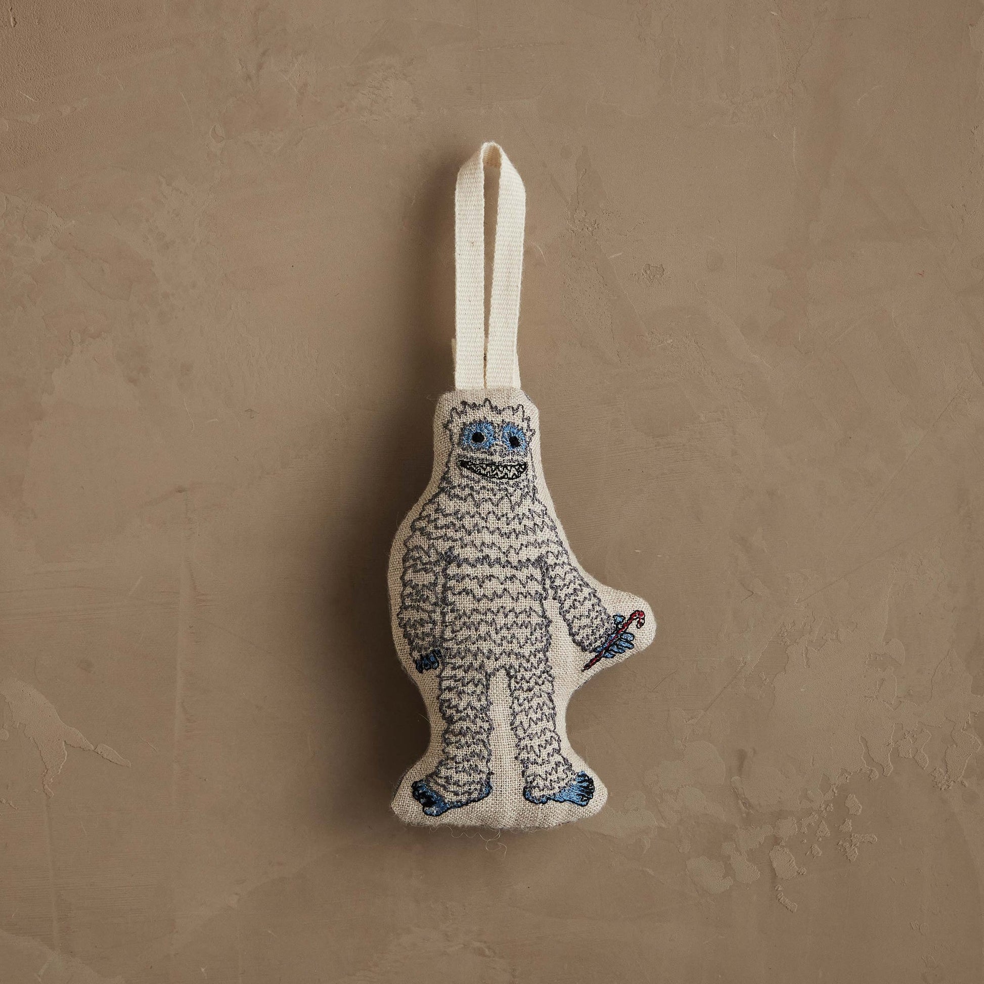 Yeti with Candy Cane Ornament by Coral & Tusk, product view