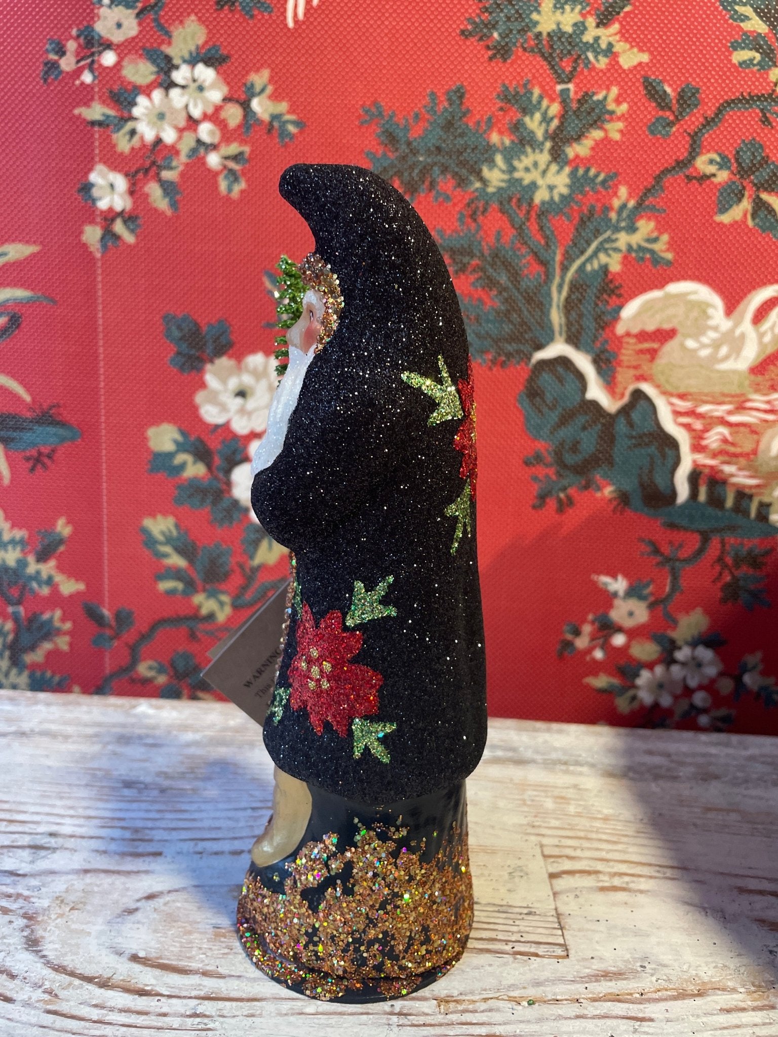 Black Glitter Santa With Poinsettia | Ino Schaller - Bon Ton goods