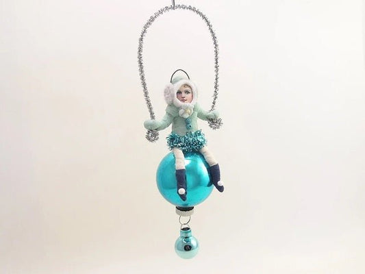 Blue Earmuff Child On Glass Ball | Vintage by Crystal Spun Cotton Ornament - Bon Ton goods