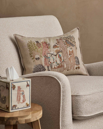Storytime Pillow styled on a chair