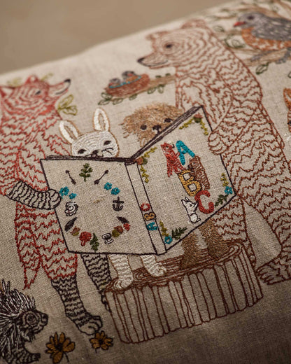 Close-up of Storytime Pillow embroidered animals