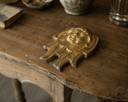 Gilded Bronze Cherub Wall Relief - Bon Ton goods