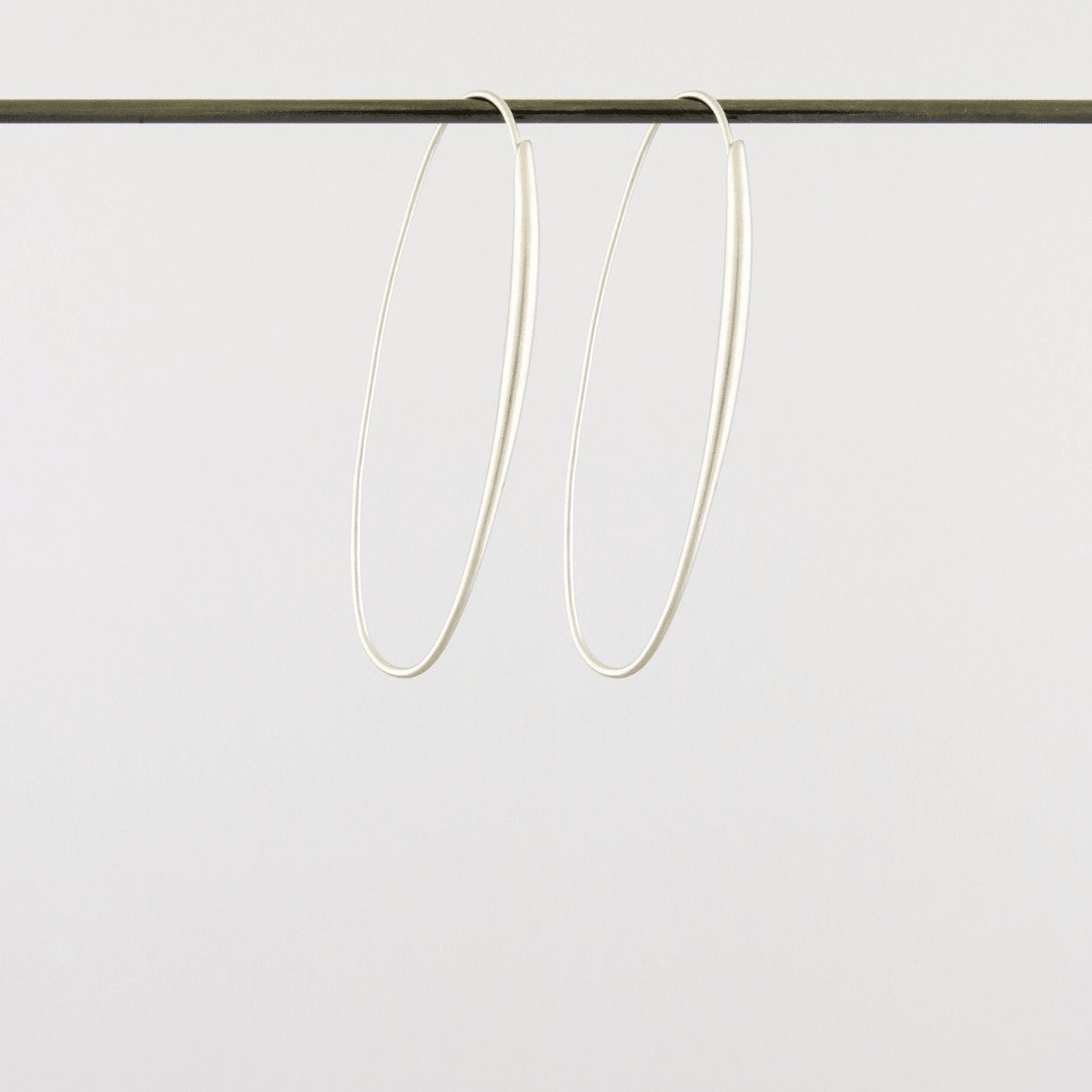 Oval Hoops White Gold | Ted Muehling - Bon Ton goods