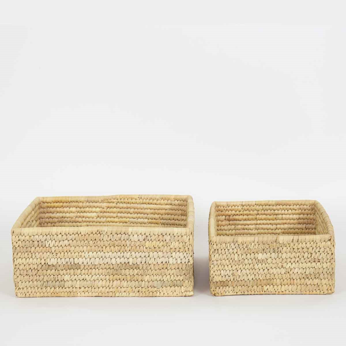Large rectangular palm basket on the left and small rectangular palm basket on the right, sold individually