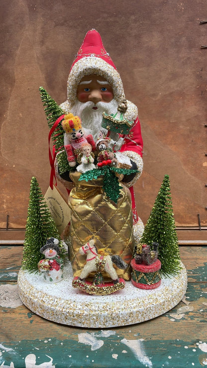 Postpox Red Santa with Gold & Silver Decoration & Crystals, Soft Gold Bag with Toys on Display | Ino Schaller - Bon Ton goods
