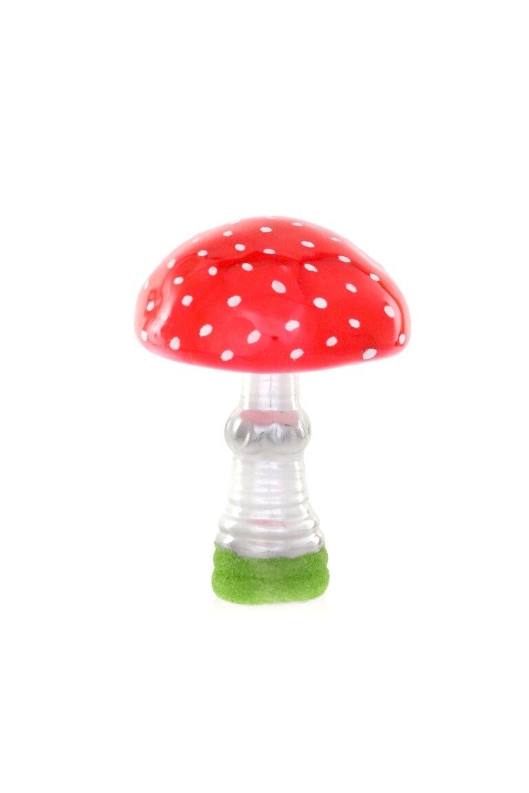 Small red glass mushroom decoration by Cody Foster