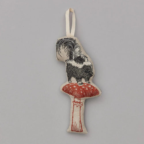 Skunk with Mushroom Ornament - Bon Ton goods