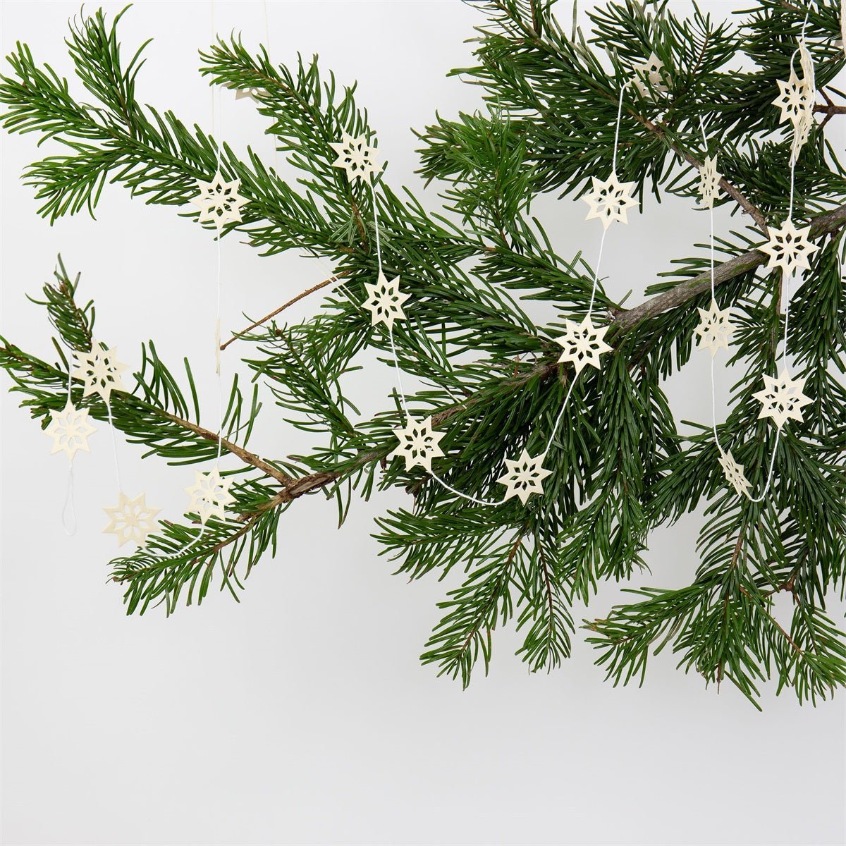Stella Star Garland, Natural | Christmas Ornament - Bon Ton goods