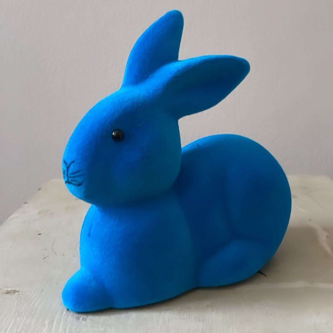 True Blue Little Bunny Lying | Ino Schaller - Bon Ton goods