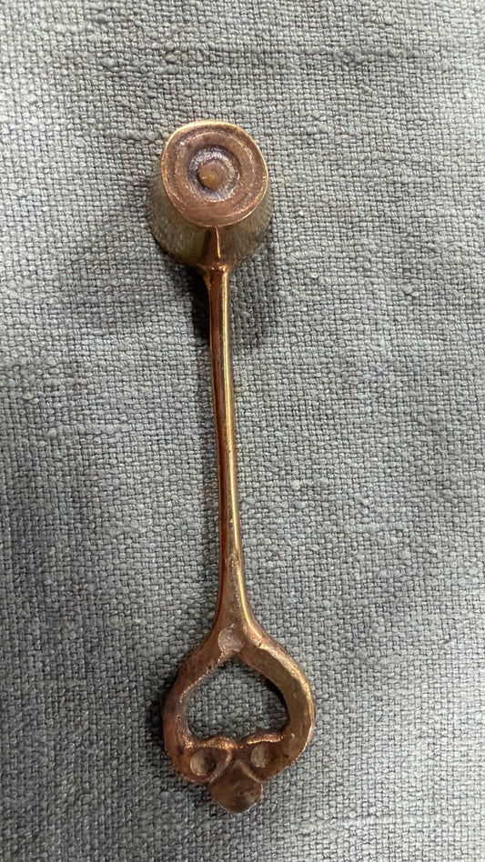 Vintage brass candle snuffer with round bell head and heart-shaped handle, 15 cm long