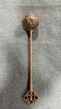 Vintage brass candle snuffer with fluted floral head and ornate openwork handle, 17 cm long