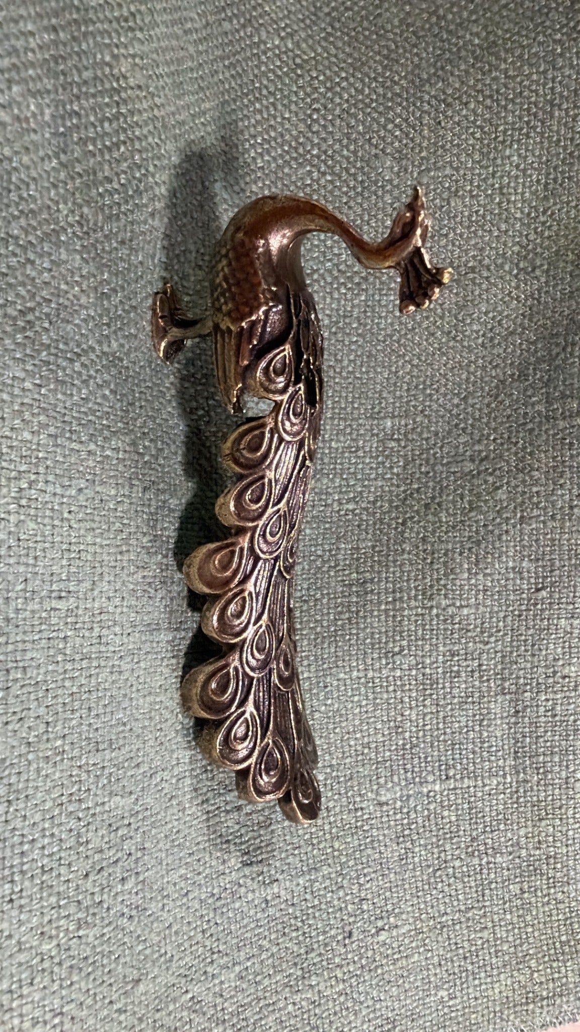 Vintage French brass peacock, 12 cm, with a curved neck and patterned tail