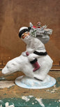 White Glitter Santa with Black Beaded Trim & Bag of Toys on Polar Bear | Ino Schaller - Bon Ton goods
