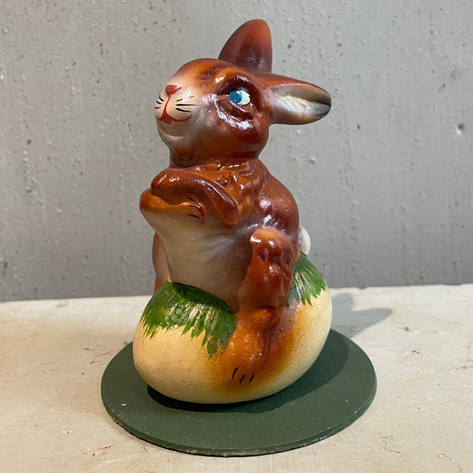 Happy Bunny Sitting on Egg - Ino Schaller