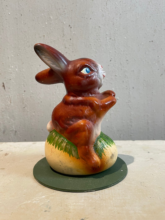 Happy Bunny Sitting on Egg - Ino Schaller